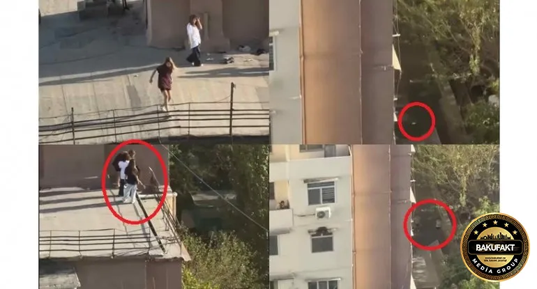 Bakıda qızlar binanın damında içki içib butulkanı insanların başına atdı - VİDEO
