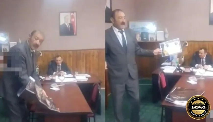 Məmura mükafat verən "jurnalist" həbs olundu