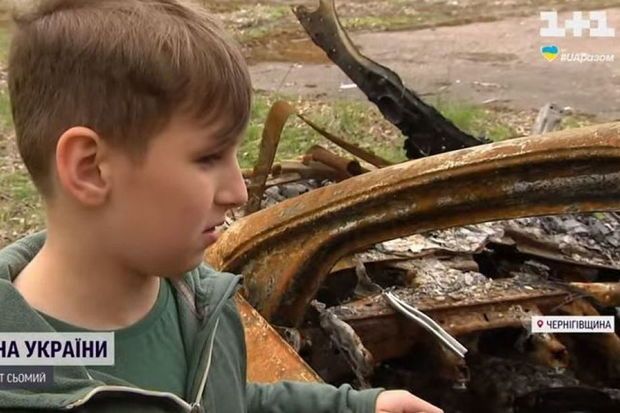 Gözü qarşısında anası yandırılan ukraynalı uşaq heç kimə ağlamağa icazə vermir
